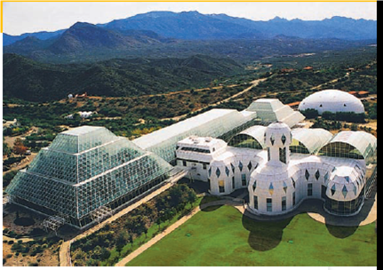 BIOSPHERE 2-A LESSON IN HUMILITY In 1991, eight scientists (four men and four women) were sealed inside Biosphere 2, a $200 million glass and steel enclosure designed to be a selfsustaining life-support system (Figure 17.A) that would increase our understanding of Biosphere 1-the earth's life-support system. This sealed system of interconnected domes was built in the desert near Tucson, Arizona. It contained artificial ecosystems including a tropical rain forest, a savanna, a desert, a lake, streams, freshwater and saltwater wetlands, and a mini-ocean with a coral reef. Biosphere 2 was designed to mimic the earth's natural chemical cycling systems. Water evaporated from its ocean and other aquatic systems and then condensed to provide rainfall over the tropical rain forest. The precipitation trickled through soil filters into the marshes and back into the mini-ocean before beginning the cycle again. The facility was stocked with more than 4,000 species of plants and animals, including small primates, chickens, cats, and insects, selected to help maintain life-support functions. Human and animal excrement and other wastes were treated and recycled to help support plant growth. Sunlight and external natural gas-powered generators provided energy. The Biospherians were to be isolated for 2 years and to raise their own food using intensive organic agriculture. They were to breathe air recirculated by plants and to drink water cleansed by natural chemical recycling processes. From the beginning, many unexpected problems cropped up and the life-support system began to unravel. The level of oxygen in the air declined with soil organisms converting it to carbon dioxide. Additional oxygen had to be pumped in from the outside to keep the Biospherians from suffocating. Tropical birds died after the first freeze. An ant species got into the enclosure, proliferated, and killed off most of the system's original insect species. In total, 19 of the Biosphere's 25 small animal species became extinct. Before the 2-year period was over, all plant-pollinating insects became extinct, thereby dooming to extinction most of the plant species. Despite many problems, the facility's waste and wastewater were recycled. With much hard work, the Biospherians were also able to produce 80% of their food supply. However, they suffered from persistent hunger and weight loss. In the end, an expenditure of $200 million failed to maintain a life-support system for eight people for 2 years. Ecologists Joel Cohen and David Tilman, who evaluated the project, concluded, No one yet knows how to engineer systems that provide humans with life-supporting services that natural ecosystems provide for free. Critical Thinking Some analysts argue that the problems with Biosphere 2 resulted mostly from inadequate design and that a better team of scientists and engineers could make it work. Explain why you agree or disagree with this view. FIGURE 17.A Biosphere 2, constructed near Tucson, Arizona, was designed to be a self-sustaining life-support system. PRNewsFoto/Huron Valley Travel/AP Images