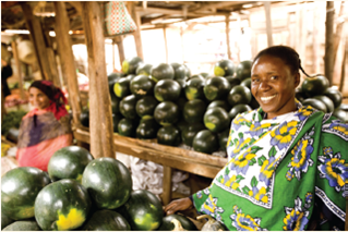 Microloan Bankers: Charity or For-Profit Business Model? This is Sophia Maimu, a melon stand owner and microloan client of ACCION Tanzanian partner, Akiba Commercial Bank. You might think it would be utter folly to lend money to the poor in a developing country. What about a loan to a new small business or entrepreneur such as a vegetable peddler, tailor, or candle maker? Worldwide, development organizations are finding that some of the world's poorest entrepreneurs repay their debts at rates approaching 100 percent. To encourage grassroots private business in Latin America, Asia, and Africa, microlending organizations are expanding programs that already lend thousands of small entrepreneurs amounts ranging from $50 to several hundred dollars. Tiny businesses in developing countries commonly repay these microloans faithfully because of community pressure and the security of a favorable credit rating. Microloans give them small spurts of working capital when they need it, allow them to establish credit, and let them borrow again in hard times. The money helps them start or expand their businesses-selling vegetables, sewing, repairing shoes, making furniture, and the like-and boosts the local economy. The microcredit concept was developed by Professor Muhammad Yunus, a U.S.-trained Bangladeshi PhD economist, through the Grameen Bank in Bangladesh (which he established to administer his program), and ACCION, a U.S. microcredit organization. Dr. Yunus was awarded the Nobel Peace Prize in 2006 for his work fighting poverty. The microloan repayment performance shines when compared with that of some sovereign nations. It also looks very good compared with a default rate of 13.8 percent among U.S. recipients of federally guaranteed student loans. ACCION reports a repayment rate over the life of its program of 97 percent. A Mexican program, Compatramos, reports a 1 percent default rate. Critics point out, though, that one microloan is not going to pull a budding entrepreneur out of poverty, let alone a whole country. When Tufts University received an endowment to set up a microloan program, specialists were ready to warn Tufts of the ethical aspects of microloans: its program needs to be much more than banking. A series of loans is probably necessary, combined with training and support. Recently, several not-for-profit microloan operations have changed. Because of their success, they have become banks, and in one case, Mexico's Banco Compartamos sold 30 percent of its shares to the public, with the IPO share price moving up 34 percent. Their 2007 IPO also brought a lot of difficult issues forward. Compartamos began as a charity grant program, then became a bank, and then a publicly listed bank. The move to private ownership that seeks a return on investment changes the microloan business model substantially, from charity to business. The charity model uses donated funds and funds from international financial institutions such as the World Bank and the European Bank for Reconstruction and Development, and they have low interest rates. Some of the microcredit organizations even make profits, but they are cooperatives, such as Grameen Bank, so their profit moves back into their stakeholder community. Compartamos, in contrast, now charges its credit customers in the range of 100 percent (on an annualized basis) to cover loan interest, fees, and taxes. That is three times the cost of borrowing from other microcredit lenders. To make matters a little more complicated, many of the shareholders who profited greatly from the Compartamos IPO are themselves microlenders, such as ACCION. Tufts University splits the revenues from its microloans 50?50 with the loan program and the university itself. In 2008, the university reported a $6.60 million payout from its share of the microlending operations. a Is it right to profit from loans to the poor? Dr. Yunis thinks definitely not, and refuses to mention the words Compartamos and microfinance in the same breath. b At the same time, here's an explanation from the two friends who founded Compartamos in 1990. They suggest that, much like food crisis and famine, the issue isn't the existence of the needed good; both food and money exist. The issue is one of distribution: the food and money frequently are not where they are needed most desperately. The argument is that a profit potential brings private capital in touch with the people who need it, the world's poor, quickly and efficiently. It is a way to align the world's wealth with the world's poor. Big investment firms and banks have begun to participate in profitable microlending. Firms such as CITI Group, Morgan Stanley, TIAA-CREF, and Deutsche Bank are active in the sector now. With returns like Compartamos has, at 53 percent, investors are interested. Here's how the loans work: they are small, usually to women, guaranteed by peers, paid off on time, and often followed immediately by another loan. c In a disagreement over this very issue, Dr. Younis was ousted from his directorship of Grameen Bank in 2011. View a PBS video that explores this issue further at www.pbs.org/now/shows/338/. So, what do you think, is profiting from microloans to the poor ethical?