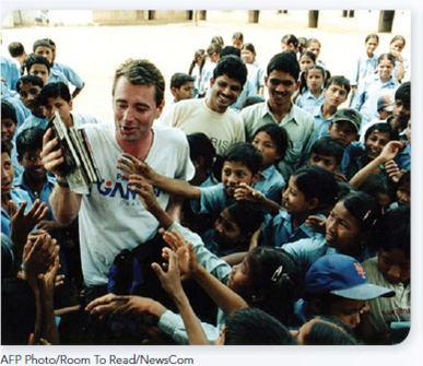 LEARN FROM ROLE MODELS His life changed and its second chapter started after a trekking holiday in Nepal. Former Microsoft Executive Fights Illiteracy and Gains Fulfillment T here are many ways to help build a better society. John Wood's choice is social entrepreneurship that promotes literacy for children in the developing world. During a successful career as a Microsoft executive, his life changed after he went on a trekking vacation to the Himalayas of Nepal. While there, Wood was shocked at the lack of schools and limited access to educational materials. He pledged to collect books for a Nepalese school that he visited on his trip, and he returned a year later with 3,000 to give to the students. But the impact on his future didn't end there. Wood was inspired to leverage his years of executive experience to accomplish more through nonprofit work. Wood quit his Microsoft job to found Room to Read. It builds libraries and schools in poor nations like Nepal, Cambodia, Vietnam, and Laos, and publishes local language books to help fill them. Now in what he calls the second chapter in his life, Wood's passion is to provide the lifelong benefits of education to poor children. His organization's website describes the vision this way: We envision a world in which all children can pursue a quality education that enables them to reach their full potential and contribute to their community and the world. Picture this scene in Laos, one of the world's poorest nations. Children sit happily in a small library filled with books reading a story with their teacher. It's a Room to Read project. So far the organization has put in place over 700 libraries and built 140 schools in this small land-locked Southeast Asian country. Laos has just over 8,000 primary schools nationwide and the majority offer only incomplete educational experiences. The Room to Read model is so efficient that it can build schools for as little as $6,000 and is now setting up five or six new libraries each day. Over 10,000 libraries are already in place in Asia and Sub-Saharan Africa. Time magazine called Wood and his team Asian Heroes. Fast Company magazine gave Room to Read its Social Capitalist Award. Noting that one-seventh of the global population can't read or write, Wood says: I don't see how we are going to solve the world's problems without literacy. FIND THE INSPIRATION Room to Read builds one school or library at a time, but the results add up quickly-almost 10 million children have benefited from Room to Read's programs to date. Is the success of Room to Read due in part to Wood's prior business and management experience How can such experience help nonprofit organizations Can you identify a social problem in your community that might be addressed using John Wood and his work with Room to Read as a role model How do you see yourself fulfilling higher order needs in the future Will earning good money at work be enough, or will your self-actualization require something more