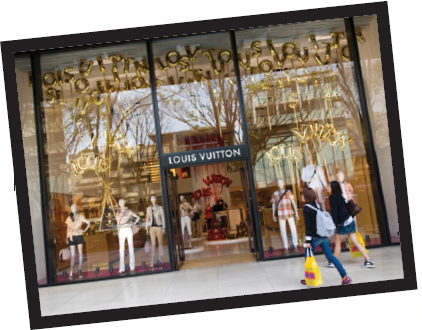 Louis Vuitton Louis Vuitton (LV) is one of the world's most legendary brands and is synonymous with images of luxury, wealth, and fashion. The company is known for its iconic handbags, leather goods, shoes, watches, jewelry, accessories, and sunglasses, and is the highest-ranked luxury brand in the world. It was 1854 when Louis Vuitton opened his first store in Paris and sold handmade, high-quality trunks and luggage. In the late 19th century, Vuitton introduced his signature Damier and Monogram Canvas materials, featuring the famous design still used in most of the company's products today. Throughout the 20th century, the company that carries his name continued to grow internationally, expanding into the fashion world by the 1950s and reaching $10 million in sales by 1977. In 1987, Louis Vuitton merged with Moët et Chandon and Hennessy, leading manufacturers of champagne and cognac, and created LVMH, a luxury goods conglomerate. Louis Vuitton's products are made with state-ofthe- art materials, and its designers use a combination of art, precision, and craftsmanship to produce only the finest products. The legendary LV monogram appears on all the company's products and stands for the highest quality, premium status, and luxury travel. Over the years, however, counterfeiting has become a huge problem and one of Louis Vuitton's most difficult challenges. Louis Vuitton is one of the most counterfeited brands in the world, and the company takes the problem very seriously because it feels that counterfeits dilute its prestigious brand image. Louis Vuitton employs a full team of lawyers and fights counterfeiting in a variety of ways with special agencies and investigative teams. Until the 1980s, Louis Vuitton products were available in a wide variety of department stores. However, to reduce the risk of counterfeiting, the company now maintains tighter control over its distribution channels. Today, it sells its products only through authentic Louis Vuitton boutiques located in upscale shopping areas and highend department stores, all run independently with their own employees and managers. Louis Vuitton prices are never reduced, and only recently did the company start selling through louisvuitton.com in hopes of reaching new consumers and regions. Over the years, a wide variety of high-profile celebrities and supermodels have used LV products, including Madonna, Audrey Hepburn, and Jennifer Lopez. In its marketing efforts, the company has used high-fashion celebrities, billboards, print ads, and its own international regatta-the Louis Vuitton Cup. Recently, LV broke tradition and featured nontraditional celebrities such as Steffi Graf, Mikhail Gorbachev, Buzz Aldrin, and Keith Richards in a campaign entitled Core Values. LV also launched its first television commercial focused on luxury traveling rather than fashion and has formed new partnerships with international artists, museums, and cultural organizations in hopes of keeping the brand fresh. That said, Louis Vuitton still spends up to 60 hours making one piece of luggage by hand-the same way it did 150 years ago. Today, Louis Vuitton holds a brand value of $26 billion according to Forbes and is ranked the 17th most powerful global brand according to Interbrand. The company is focused on expanding its luxury brand into growing markets such as China and India as well as continuing to grow in strong markets like Japan and Europe. It also continues to add new product lines to its portfolio.. Is the counterfeiting of Louis Vuitton always a negative? Are there any circumstances where it can be seen as having some positive aspects?