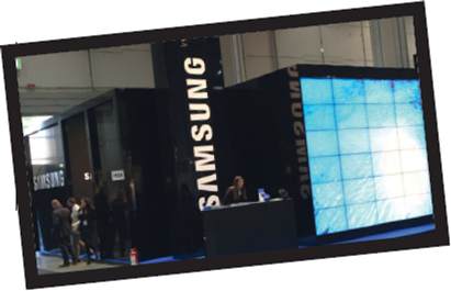 Samsung Korean consumer electronics giant Samsung has made a remarkable transformation, from a provider of valuepriced commodity products that original equipment manufacturers (OEMs) sold under their own brands, to a global marketer of premium-priced Samsung-branded consumer electronics such as flat-screen TVs, digital cameras, digital appliances, semiconductors, and cell phones. Samsung's high-end cell phones have been a growth engine for the company, which has also released a steady stream of innovations, popularizing the PDA phone, the first cell phone with an MP3 player, and the first Blu-ray disc player. Samsung initially focused on volume and market domination rather than profitability. However, during the Asian financial crisis of the late 1990s, when other Korean chaebols collapsed beneath a mountain of debt, Samsung took a different approach. It cut costs and reemphasized product quality and manufacturing flexibility, which allowed its consumer electronics to go from project phase to store shelves within six months. Samsung invested heavily in innovation and focused intently on its memory-chip business, which established an important cash cow and rapidly made the company the largest chip maker in the world. The company continued to pour money into R D during the 2000s, budgeting $40 billion for 2005-2010. Its focus on R D and increasing digital convergence have let Samsung introduce a wide range of electronic products under its strong brand umbrella. The firm also partnered with longtime market leader Sony to create a $2 billion state-of-the-art LCD factory in South Korea and signed a milestone agreement to share 24,000 basic patents for components and production processes. Samsung's success has been driven not only by successful product innovation, but also by aggressive brand building over the last decade. From 1998 to 2009, the company spent over $7 billion in marketing, sponsored six Olympics, and ran several global ad campaigns themed Imagine, Quietly Brilliant, and YOU, all which included brand messages such as technology, design, and sensation (human). In 2005, Samsung surpassed Sony in the Interbrand brand ranking for the first time and continues to outperform Sony today. The economic downturn during 2008 and 2009 significantly affected the semiconductor industry, overall consumer electronics sales, and Samsung's bottom line. To survive, Samsung slashed profit margins, decreased production, and cut inventories. As a result, the company emerged at the end of 2009 with record-high quarterly profits despite significantly smaller profit margins. Today, Samsung is the global leader in flat-panel TVs and memory chips, and the number two player in mobile phones. It is focused on growing technologies such as smart phones and has partnered with both Microsoft's Windows Mobile and Google's Android software. In addition, Samsung has formed a green partnership with Microsoft to help create energy-efficient computers. Unlike rival firms, Samsung has become a global leader by making both components for electronics products and the actual devices sold to consumers, and without acquiring major competitors. It has more than doubled its employees from a decade ago to over 164,000 around the world. With record sales of $110 billion in 2008, the company's CEO, Lee Yoon-woo, announced the firm hopes to hit $400 billion in revenue by the year 2020. To accomplish this aggressive goal, Samsung will explore areas like health care and home energy products. What are some of Samsung's greatest competitive strengths?