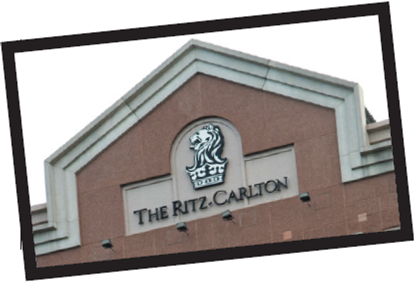 The Ritz-Carlton Few brands attain such a high standard of customer service as the luxury hotel, The Ritz-Carlton. The Ritz- Carlton dates back to the early 20th century and the original Ritz-Carlton Boston, which revolutionized the way U.S. travelers viewed and experienced customer service and luxury in a hotel. The Ritz-Carlton Boston was the first of its kind to provide guests with a private bath in each guest room, fresh flowers throughout the hotel, and an entire staff dressed in formal white tie, black tie, or morning coat attire. In 1983, hotelier Horst Schulze and a four-person development team acquired the rights to the Ritz-Carlton name and created the Ritz-Carlton concept as it is known today: a company-wide concentration on both the personal and the functional side of service. The five-star hotel provides impeccable facilities but also takes customer service extremely seriously. Its credo is, We are Ladies and Gentlemen serving Ladies and Gentlemen. According to the company's Web site, The Ritz-Carlton pledge(s) to provide the finest personal service and facilities for our guests who will always enjoy a warm, relaxed, yet refined ambience. The Ritz-Carlton fulfills this promise by providing impeccable training for its employees and executing its Three Steps of Service and 12 Service Values. The Three Steps of Service state that employees must use a warm and sincere greeting always using the guest's name, anticipate and fulfill each guest's needs, and give a warm good-bye again using the guest's name. Every manager carries a laminated card with the 12 Service Values, which include bullets such as number 3: I am empowered to create unique, memorable and personal experiences for our guests, and number 10: I am proud of my professional appearance, language and behavior. Simon Cooper, the company president and chief operating officer, explained, It's all about people. Nobody has an emotional experience with a thing. We're appealing to emotions. The Ritz-Carlton's 38,000 employees at 70 hotels in 24 countries go out of their way to create unique and memorable experiences for their guests. While The Ritz-Carlton is known for training its employees on exceptional customer service, the hotel also reinforces its mission and values to its employees on a daily basis. Each day, managers gather their employees for a 15-minute line up. During this time, managers touch base with their employees, resolve any impending problems, and spend the remaining time reading and discussing what The Ritz-Carlton calls wow stories. The same wow story of the day is read to every single employee around the world. These true stories recognize an individual employee for his or her outstanding customer service and also highlight one of the 12 Service Values. For example, one family staying at the Ritz-Carlton, Bali, needed a particular type of egg and milk for their son who suffered from food allergies. Employees could not find the appropriate items in town, but the executive chef at the hotel remembered a store in Singapore that sold them. He contacted his mother-in-law, who purchased the items and personally flew them over 1,000 miles to Bali for the family. This example showcased Service Value 6: I own and immediately resolve guests' problems. In another instance, a waiter overheard a man telling his wife, who used a wheelchair, that it was too bad he couldn't get her down to the beach. The waiter told the maintenance crew, and by the next day they had constructed a wooden walkway down to the beach and pitched a tent at the far end where the couple had dinner. According to Cooper, the daily wow story is the best way to communicate what we expect from our ladies and gentlemen around the world. Every story reinforces the actions we are looking for and demonstrates how each and every person in our organization contributes to our service values. As part of company policy, each employee is entitled to spend up to $2,000 on a guest to help deliver an anticipated need or desire. The hotel measures the success of its customer service efforts through Gallup phone interviews, which ask both functional and emotional questions. Functional questions ask How was the meal? Was your bedroom clean? while emotional questions uncover a sense of the customer's well-being. The Ritz- Carlton uses these findings as well as day-to-day experiences to continually enhance and improve the experience for its guests. In less than three decades, The Ritz-Carlton has grown from 4 locations to over 70 and earned two Malcolm Baldrige Quality Awards-the only company ever to win the prestigious award twice. Discuss the importance of the wow stories in customer service for a luxury hotel like The Ritz-Carlton.