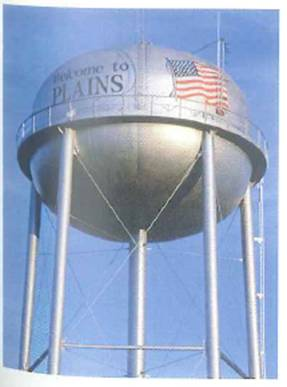 Water towers (storage tanks) are generally bulb shaped, as shown in Fig. Wouldn't it be better to have a cylindrical storage tank of the same height Explain. FIGURE Why a bulb-shaped water tower See Conceptual Question.