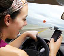 Texting: How Distracting Can It Be? YouTube has videos of young adults texting while driving, and Facebook has a group called I Text Message People While Driving and I Haven't Crashed Yet! Many people are routinely texting while on the move, whether it's waiting in line for coffee, walking across the street, or driving. Is texting a big enough distraction to put people at risk of danger? The American College of Emergency Physicians believes so. They report that many people arrive in the emergency department with serious, sometime fatal injuries because they weren't paying attention to their surroundings while texting. Be honest-how many times have you been texting while driving and looked up only to be surprised you haven't been paying attention to the road? The dangers of texting while driving are so serious that 35 states and the District of Columbia have laws banning text messaging for all drivers. Though no state entirely bans the use of cell phones while driving, nine states and the District of Columbia ban drivers from using handheld cell phones while driving. It seems that the restrictions on using phones while driving will only become more strict. For instance, the Transportation Department has recently proposed guidelines aimed at disabling test messaging, Internet browsing, navigation destination entry, and phone dialing if the car is not in the Park position. The use of a cell phone in any way while driving increases the risk of an accident, and texting is more dangerous than talking. A driver's risk of getting into an accident is believed to increase sixfold when texting and fourfold when talking on a handheld cell phone. One study reported that texting increases the risk of a near-crash by up to 23 times. Another study found that cell phone use caused distractions comparable to those that occur while driving intoxicated. Not only is texting distracting during our waking day, but for some, it can be a problem during sleep. Teens and young adults, in particular, go to sleep with their phones plugged in right by their beds. With every beep of a new text message, they awaken, disrupting their sleep and thereby affecting their cognitive and physical performance the next day. There have even been rumors of sleep texting-that is, texting during sleep only to discover in the morning the texts sent in the middle of night. The dangers of texting seem countless: injuring oneself or others, death, and tremendous embarrassment (who knows what you might text while asleep!). Question What stage of sleep must people be in if they're unknowingly texting during the night?