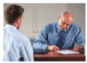 The recall of eyewitnesses may be improved by having them imagine and reconstruct the details of an event, report everything that they remember, and report things from different viewpoints. This method is called the (a) _____. With this method, eyewitnesses remember much more information about the event than they do when asked standard questions. This questioning procedure also helps to eliminate suggestions or source misattributions, which can result in implanting (b) _____ in witnesses.  