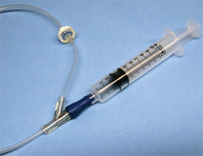 This is an example of a(n) _______________ syringe used to inject medication into an existing IV line.  <div style=padding-top: 35px> 