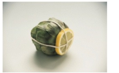 <strong>In the picture, a slice of lemon is tied to the bottom of the artichoke for what purpose? </strong> A) To keep the stem end from darkening during steaming or boiling B) To add flavor C) For a colorful presentation D) To keep the leaves in tact