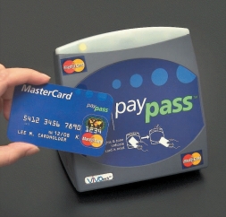 -Referring to the accompanying figure, this pad where you either wave or tap the card to pay with your credit card is a type of ____ payment system.