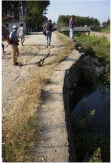 <strong>Use the following map related to the December 24<sup>th</sup>, 2004 Sumatra earthquake to answer this question.    -What type of fault caused the canal damage shown in the following photograph (photo courtesy USGS)?  </strong> A) Normal fault B) Reverse fault C) Strike-slip <div style=padding-top: 35px> 
