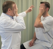 <strong> The patient covers one eye. You place your hand with extended fingers behind the patient's field of vision and move your fingers toward the patient's field of vision. What assessment technique are you performing?</strong> A) Consensual response B) Confrontation test C) Test for accommodation D) Ocular mobility test