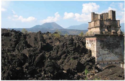 <strong>This figure shows the facade of the church of Paricutin,engulfed in a field of lava flows.Based on the texture of this basaltic lava,we can determine that it is __________. </strong> A) aa B) tephra C) pillow D) pahoehoe