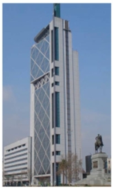 <strong>The building above (Figure 3.36 in textbook)has been strengthened by </strong> A) adding infill walls. B) adding frames to the exterior. C) adding a buttress. D) isolating the building from the ground. E) adding braces.