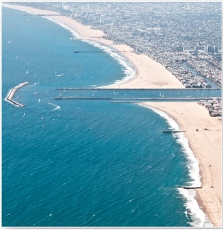 <strong> Which are these features that block material from entering a harbour?</strong> A)Breakwaters. B)Groins. C)Jetties. D)Tombolos.