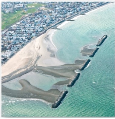 <strong> Which are these features that create zones of still water near coastlines?</strong> A)Breakwaters. B)Groins. C)Jetties. D)Tombolos.