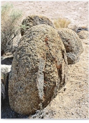 <strong> These rounded granite outcrops are the result of which weathering process?</strong> A)Oxidation. B)Hydration. C)Spheroidal weathering. D)Carbonation.