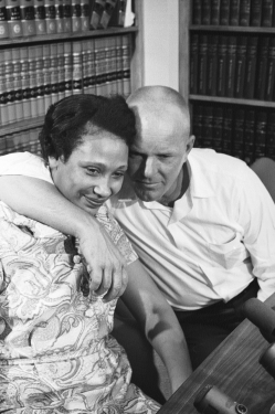 The Lovings embrace in this photograph,celebrating the Supreme Court decision that,in Loving v.Virginia (1967),struck down America's ________ laws.