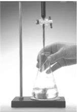 <strong>A hydrochloric acid solution is standardized by titrating against solid sodium carbonate as shown in the following image.The HCl is in the buret and the sodium carbonate in the flask. The equation is 2 HCl(aq)+ Na<sub>2</sub>CO<sub>3</sub>(s)→ 2 NaCl(aq)+ H<sub>2</sub>O( )+ CO<sub>2</sub>(g).If 23.4 mL of the solution is added from the buret to neutralize 0.157 g Na<sub>2</sub>CO<sub>3</sub> in the flask.what is the molarity of the HCl solution?</strong> A)0.0316 M B)0.0633 M C)7.90 M D)0.253 M E)0.127 M