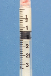 Identify the dosage measured on the syringe.
