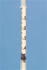 Identify the dosage measured on the syringe.