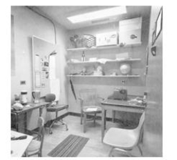<strong>Participants waited briefly in a psychology professor's office(pictured below) and were then taken to another room and asked to recall details of the office. The results showed thatmany participants erroneously remembered objects that were not actually present in the office. These memory errors were most likely the result of: </strong> A)nervousness and apprehension that the participants experienced due to being left alone in the professor's office. B)the use of schemas, which included items that would be consistent with a typical professor's office C)imagination inflation as the participants vividly imagined being back in the professor's office during the recall test in the second room. D)the misinformation effect because the room where the memory test took place had many false retrieval cues present.