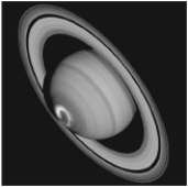 The figure below shows a picture of Saturn taken by the Hubble Space Telescope. What is causing the circle of light seen near the Saturn's pole?