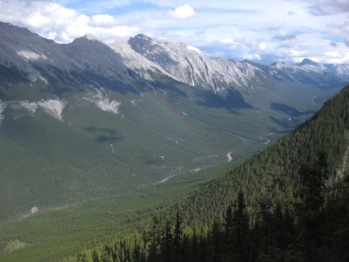 <strong>  What formed this valley's distinctive U shape?</strong> A)river erosion B)wind erosion C)dune movement D)glacial erosion <div style=padding-top: 35px> 
