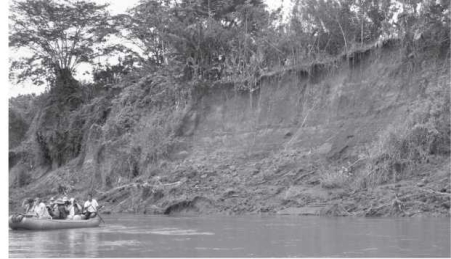 <strong>The image below shows a cut bank along a river that was formed by a </strong> A)lahar. B)rock fall. C)slump. D)debris slide.