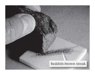 <strong>For the majority of minerals,the streak color obtained when the mineral is scratched against a porcelain plate is ____________. </strong> A)likely to be diagnostic only if the mineral is hard enough to scratch porcelain B)more variable than the color in a hand sample among crystals C)less variable than the color in a hand sample among crystals D)always dark brown or black