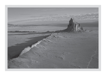 <strong>A volcanic neck,such as that seen at Shiprock,New Mexico (below),is a(n)____________.  </strong> A)sheet-like intrusion that lies parallel to surrounding layers of sedimentary rock B)cooled layer of lava C)intrusion formed within the magma chamber of a volcano D)sheet-like intrusion that cuts across preexisting layers <div style=padding-top: 35px> 