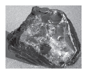 <strong>Obsidian,shown below,____________.  </strong> A)is volcanic glass B)possesses conchoidal fracture C)typically is felsic in composition D)All of the above are correct. <div style=padding-top: 35px> 