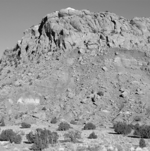 <strong>What type of weathering has happened to the rocks in the picture?  </strong> A) hydrolysis B) hydration C) dissolution D) oxidation <div style=padding-top: 35px> 