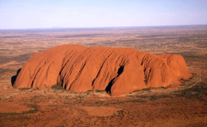 In the figure below,Ayer's Rock (Australia)was formed by _______.