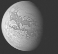 <strong>Examine the image below. Titan is a prime candidate for life outside Earth because it has:</strong> A) liquid water B) a dense atmosphere like Earth's C) active volcanoes D) organic material