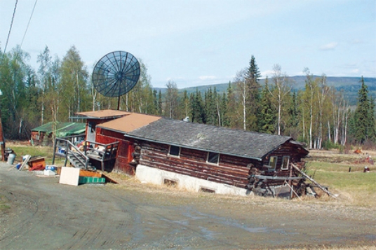 <strong>The most likely reason that this building in the tundra environment has a failed foundation is that </strong> A)the permafrost beneath it has thawed. B)running water after a flood has swept it away. C)mass wasting processes have caused the soil to slump. D)a wind storm has detached the building from its foundation.