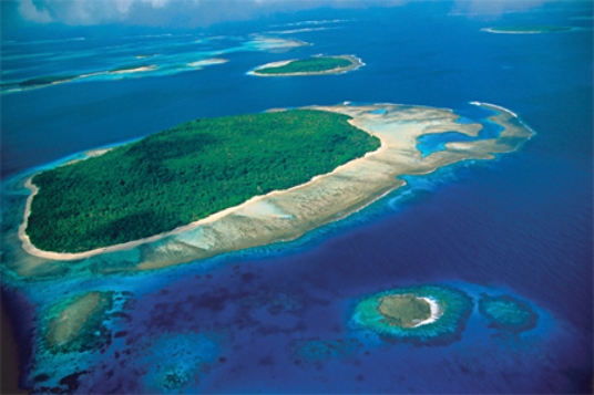 <strong>The small island on the lower right of this photograph is a(n) </strong> A)sea stack. B)fringing reef. C)atoll. D)sandbar.