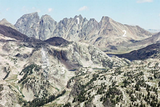 Which numbered feature(s)on this photograph are consistent with the presence of glaciers sometime in the past?