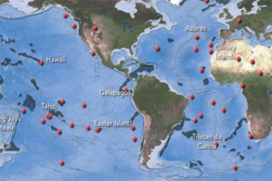 <strong>The red dots that coincide with volcanically active island chains shown on the map are called </strong> A)hot spots. B)mid-ocean ridges. C)abyssal plains. D)island arcs.
