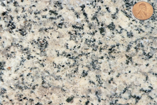 <strong>Which of the following rock photographs depicts an igneous rock that trapped gas?</strong> A) B) C) D)