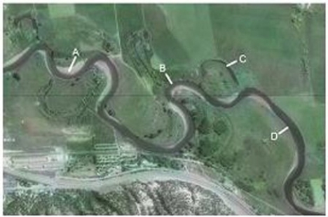 <strong>Which of the features on this aerial photograph is an oxbow lake? </strong> A)A B)B C)C D)D