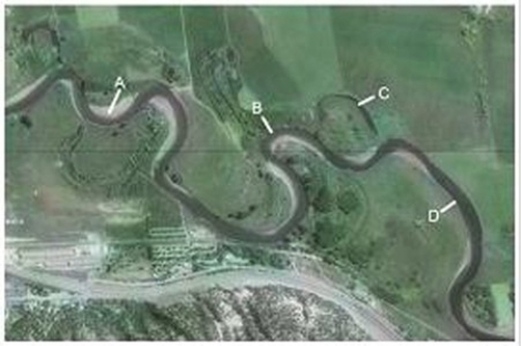 <strong>Which of the features on this aerial photograph represents the former position of a meander? </strong> A)A B)B C)C D)D E)Both C and D