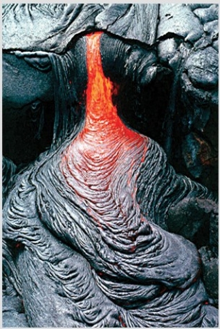 <strong>What type of basaltic feature is shown in this photograph? </strong> A)Vesicles B)Volcanic bomb C)Aa lava flow D)Pahoehoe lava flow E)Pyroclastic flow