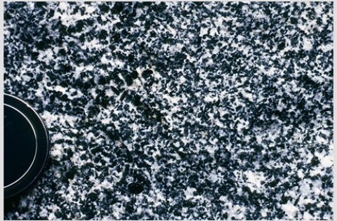 <strong>Which of the following rock photographs depicts a felsic igneous rock?</strong> A)   B)   C)   D)   <div style=padding-top: 35px> 