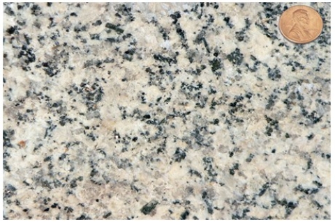 <strong>Which of the following rock photographs depicts an igneous rock that trapped gas?</strong> A)   B)   C)   D)   <div style=padding-top: 35px> 