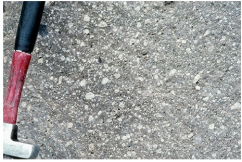 <strong>Which of the following rock photographs depicts an igneous rock that trapped gas?</strong> A)   B)   C)   D)   <div style=padding-top: 35px> 
