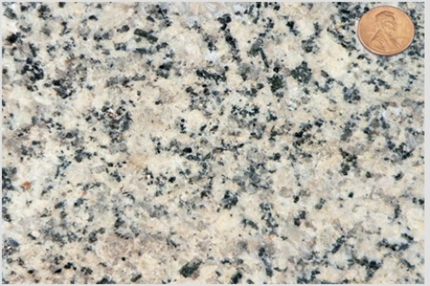 <strong>Which of the following photographs depicts an igneous rock where the magma cooled slowly at first and then had fast cooling?</strong> A)   B)   C)   D)   <div style=padding-top: 35px> 
