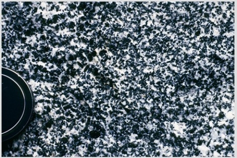 <strong>Which of the following photographs depicts an igneous rock where the magma cooled slowly at first and then had fast cooling?</strong> A)   B)   C)   D)   <div style=padding-top: 35px> 