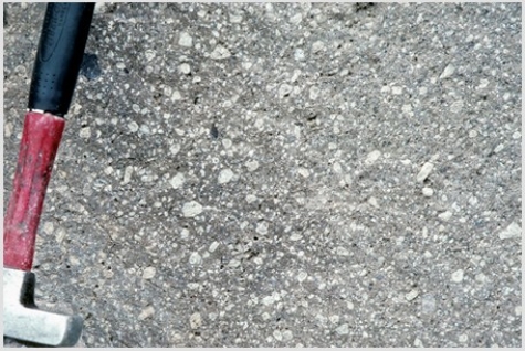 <strong>Which of the following photographs depicts an igneous rock where the magma cooled slowly at first and then had fast cooling?</strong> A)   B)   C)   D)   <div style=padding-top: 35px> 