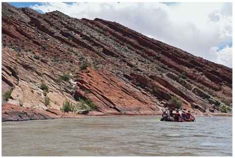 The oldest layer in this tilted sequence of sedimentary rocks is