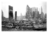 <strong>What likely caused much of the damage shown in this photograph in the 1906 San Francisco earthquake? </strong> A)a breakdown in the computerized warning system B)a tsunami C)fires that broke out after the earthquake D)ground ruptures,cracks,and fissures