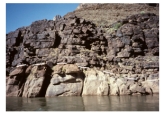 <strong>In this photograph,Paleozoic sandstone rests depositionally on Precambrian granite.What events must have occurred before deposition of the sandstone? </strong> A)uplift of granite to the surface B)solidification of granite at depth C)formation of an erosion surface D)all of these E)none of these